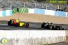 Robert Kubica (Renault) y Heikki Kovalainen (Lotus)